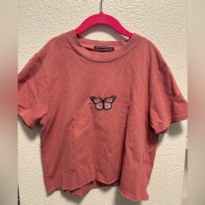 Brandy Melville cropped shirt, not sure what size but I think small